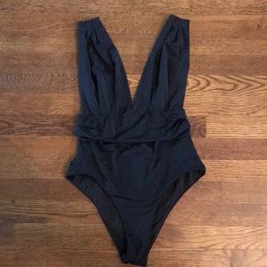 Black plunging one piece swimsuit size 4-6